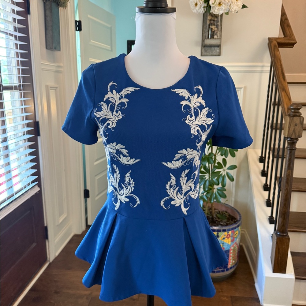Anthropologie Lush NWOT Elegant Blue Peplum Top with White Embroidery